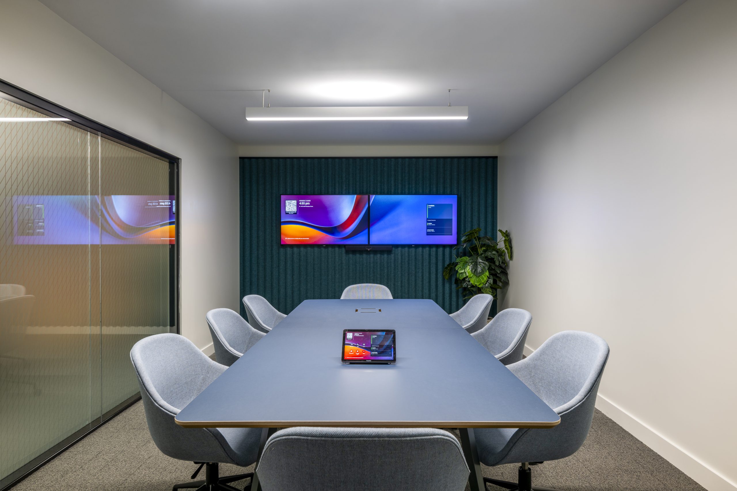 Compact huddle room with one-touch video conferencing