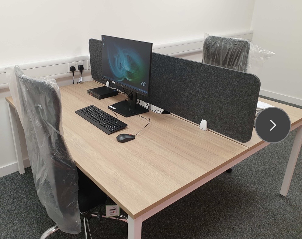 A close-up of a desk setup from an Efficient IS office fit-out