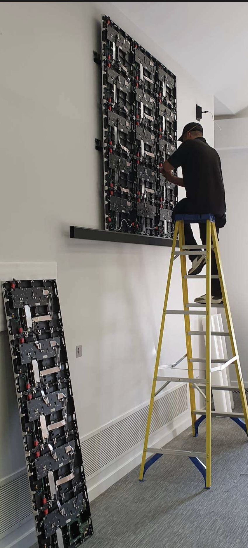 The LED video wall at the SFRS Cambuslang auditorium partway through installation