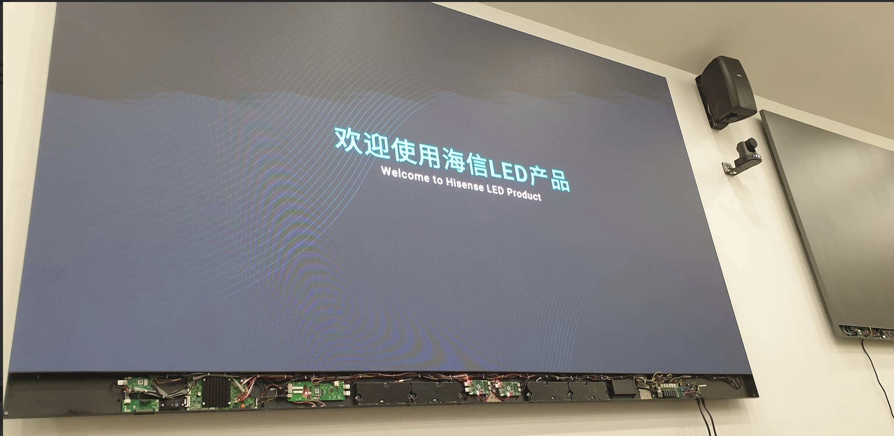 The completed LED video wall at the SFRS Cambuslang auditorium, powered on and running content