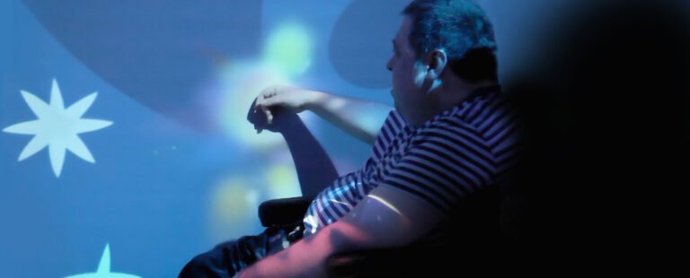 Immersive sensory room - calming projected light and colour effects used to create a structured, low-stimulation environment
